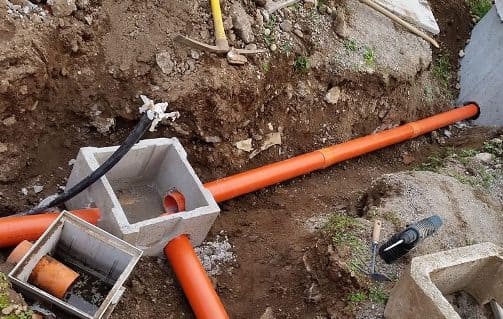La realizzazione di un pozzetto pluviale avente un costo di 250,00 €.