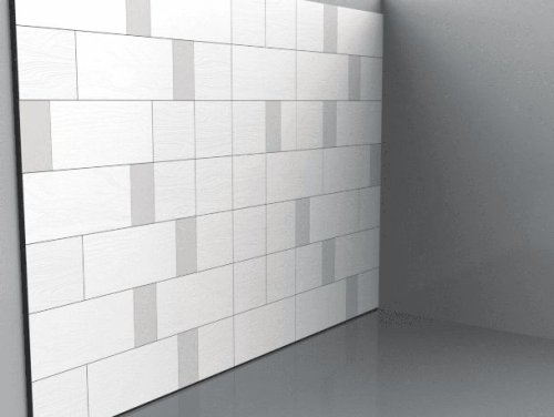 Una parete isolata acusticamente grazie a dei pannelli fonoassorbenti.