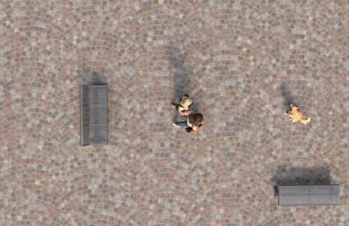 un pavimento esterno fatto con blocchetti di porfido.