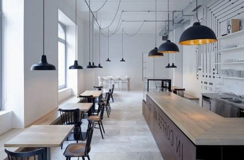 Il render per la ristrutturazione di un bar in stile minimalista